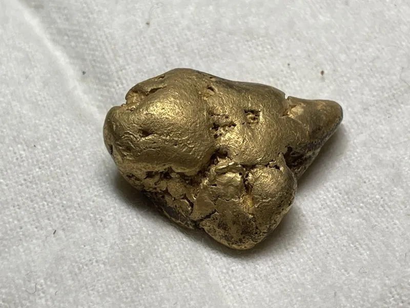 Gold find photo shared in the Detector Maps community feed